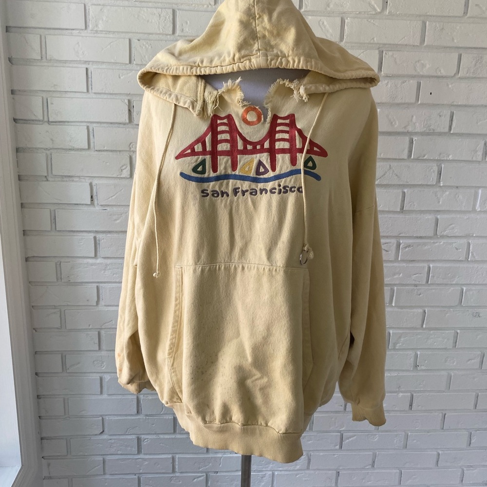 Pastel yellow San Francisco hoodie.